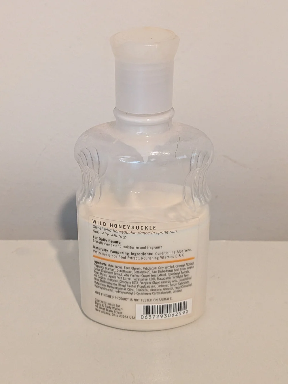 Bath & Body Works Pleasures Wild Honeysuckle Body Lotion - Cream & Green Accents